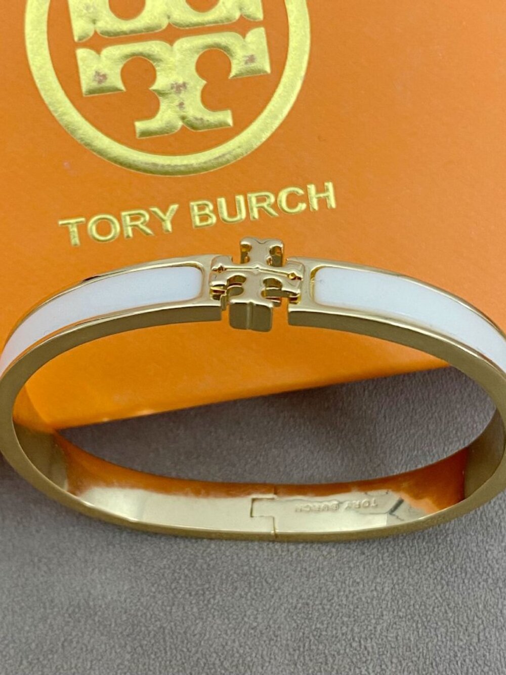 Tory Burch Gold‑Tone White Enamel Logo Hinged Bangle Bracelet